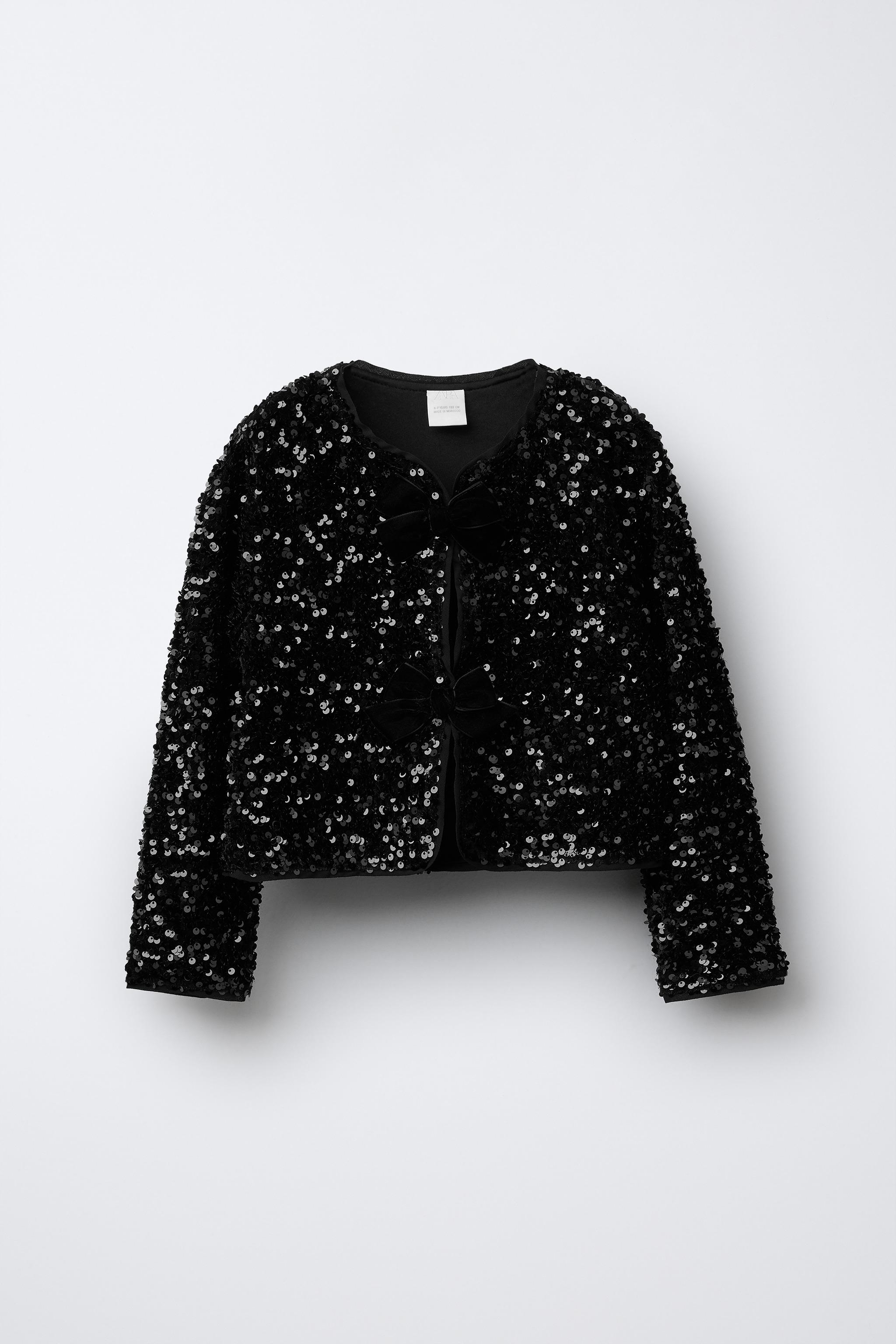 SEQUINED BOW BOLERO